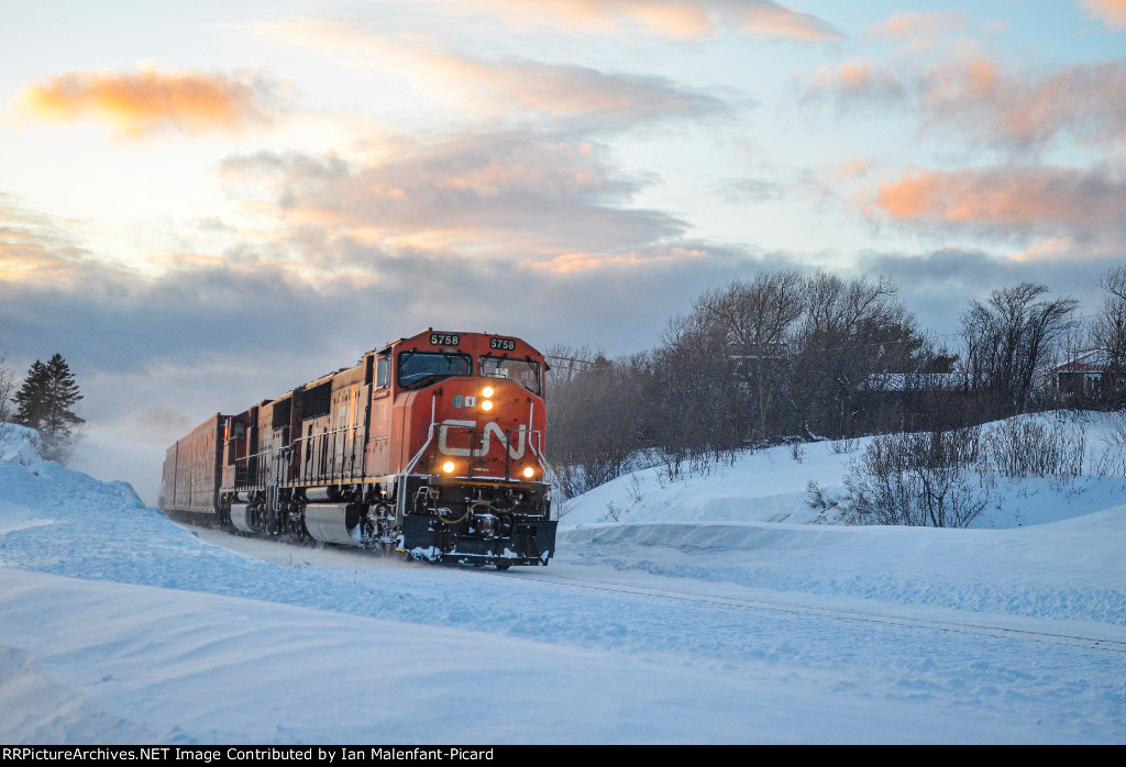 CN 5758 leads 402 at dusk